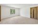 Bedroom with plush carpeting and a big window allowing for natural light at 1095 Lanier Pl, Cumming, GA 30041