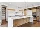 Spacious kitchen featuring a large island, stainless steel appliances, and contemporary design at 1095 Lanier Pl, Cumming, GA 30041