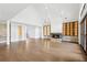 Large open concept living room with fireplace and lots of natural light at 1095 Lanier Pl, Cumming, GA 30041