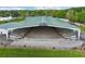 Outdoor arena with expansive seating under an open-air structure at 1095 Lanier Pl, Cumming, GA 30041