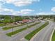 Expansive parking lot and buildings, with meticulously maintained green spaces at 1095 Lanier Pl, Cumming, GA 30041