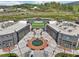 Aerial view of a modern shopping center with unique architectural details and a central plaza at 1095 Lanier Pl, Cumming, GA 30041