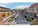Charming street view featuring a mix of retail and residential buildings with ample parking and pedestrian walkways at 1095 Lanier Pl, Cumming, GA 30041