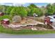 Scenic waterwheel, streams, and wooded area, offering a unique and enchanting outdoor experience for all visitors at 1095 Lanier Pl, Cumming, GA 30041