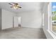 Spacious bedroom with plush carpet, offering natural light and ample space at 136 Grant Dr, Canton, GA 30114