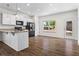 Open concept kitchen with granite countertops and access to backyard at 136 Grant Dr, Canton, GA 30114