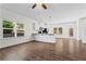 Open concept living area with hardwood floors and access to backyard at 136 Grant Dr, Canton, GA 30114