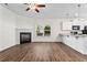 Open concept living area with fireplace and natural lighting at 136 Grant Dr, Canton, GA 30114