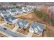 Aerial view of a residential neighborhood showcasing well-maintained homes and expansive yards at 3945 Starwood Dr, Cumming, GA 30028