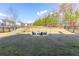 Backyard with a fire pit and plenty of seating for entertaining at 3945 Starwood Dr, Cumming, GA 30028