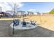 Backyard firepit surrounded by seating, perfect for outdoor entertaining at 3945 Starwood Dr, Cumming, GA 30028