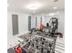 Basement gym with modern exercise equipment and foosball table offers space for recreation and fitness at 3945 Starwood Dr, Cumming, GA 30028