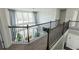 Bright and airy two-story interior with large windows and modern railing at 3945 Starwood Dr, Cumming, GA 30028