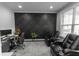 A living room with comfortable seating, offering a relaxing atmosphere with natural light at 3945 Starwood Dr, Cumming, GA 30028