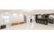 Finished basement with polished floors, a modern wet bar, and ample entertainment space at 3945 Starwood Dr, Cumming, GA 30028