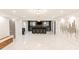 Finished basement with polished floors, bar seating, and stylish lighting, perfect for entertaining at 3945 Starwood Dr, Cumming, GA 30028