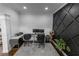 Office space featuring a dark accent wall, offering a private and productive workspace at 3945 Starwood Dr, Cumming, GA 30028