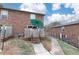 Home backyard featuring a small brick patio at 5672 Kingsport Dr # 4, Atlanta, GA 30342