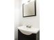 Bathroom featuring sleek vanity with sink and modern mirror at 5672 Kingsport Dr # 4, Atlanta, GA 30342