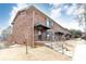 Charming brick townhome with well-maintained landscaping and inviting front entrance at 5672 Kingsport Dr # 4, Atlanta, GA 30342