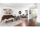 Open floor plan featuring cozy living room, dining area and hardwood floors at 5672 Kingsport Dr # 4, Atlanta, GA 30342