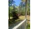 Enjoy the view of nature from the covered porch in the backyard at 1905 Rockmart Rd, Villa Rica, GA 30180