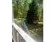 Take in the scenic surroundings from the stairs, leading down to the backyard at 1905 Rockmart Rd, Villa Rica, GA 30180