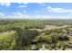 Aerial view of a neighborhood surrounded by lush greenery and recreational fields at 160 Fieldstone Dr, Powder Springs, GA 30127