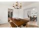 This spacious dining room features wood floors and an open floor plan at 160 Fieldstone Dr, Powder Springs, GA 30127