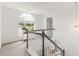 Upstairs hallway features carpeted floors and a large window at 160 Fieldstone Dr, Powder Springs, GA 30127