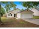 Charming single-story home with a well-manicured front yard and a two-car garage, perfect for a small Gathering at 175 Regency Park Dr, Mcdonough, GA 30253