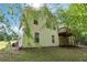 Exterior of the home showing a two story deck and a lawn area, perfect for outdoor activities and enjoyment at 1945 Grayson Oaks Ct, Lawrenceville, GA 30045