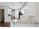 Kitchen features granite countertops, stainless appliances, and white cabinetry at 1945 Grayson Oaks Ct, Lawrenceville, GA 30045