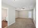 Spacious main bedroom featuring trey ceiling with fan and connecting bathroom at 1945 Grayson Oaks Ct, Lawrenceville, GA 30045
