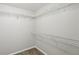 Walk-in closet features wall-mounted wire shelving for ample storage at 1945 Grayson Oaks Ct, Lawrenceville, GA 30045