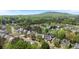 Community with tree coverage and mountain backdrop at 248 Colony Center Dr, Woodstock, GA 30188