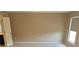 Bright bedroom with neutral carpet, large window with blinds and a door to an attached bathroom at 3687 Thackary Dr, Powder Springs, GA 30127