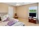 Cozy bedroom with a comfy bed, and a TV, creating a welcoming space for relaxation at 3687 Thackary Dr, Powder Springs, GA 30127