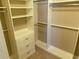 Custom closet with shelving, drawers, and hanging rods for optimal organization and storage at 3687 Thackary Dr, Powder Springs, GA 30127