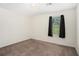 Neutral bedroom with soft carpet, window with dark curtains and natural light at 5794 Parks Rd, Cumming, GA 30041