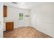 Bright kitchen area with tile floor, a view to the backyard, and white trim at 5794 Parks Rd, Cumming, GA 30041