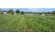 Sprawling grassy property with multiple houses, offering space and potential at 5794 Parks Rd, Cumming, GA 30041