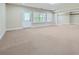 Spacious basement featuring a walkout door and several windows at 631 Mabry Rd, Sandy Springs, GA 30328