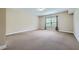 Spacious basement featuring a window and carpeting at 631 Mabry Rd, Sandy Springs, GA 30328