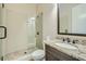 Bathroom featuring a glass shower and granite countertop at 631 Mabry Rd, Sandy Springs, GA 30328
