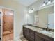 Bathroom with granite countertop, double sink and walk in shower at 631 Mabry Rd, Sandy Springs, GA 30328