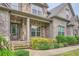Charming stone front porch with large columns and manicured landscaping adding to the home's curb appeal at 631 Mabry Rd, Sandy Springs, GA 30328