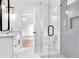 Bright bathroom featuring a glass enclosed shower, and a white vanity, offering a spa-like experience at 801 Braselton Hwy, Lawrenceville, GA 30043