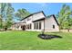 Beautiful modern farmhouse with a large yard and black trim windows at 801 Braselton Hwy, Lawrenceville, GA 30043