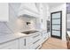New kitchen boasts marble counters, stainless appliances and modern design at 801 Braselton Hwy, Lawrenceville, GA 30043